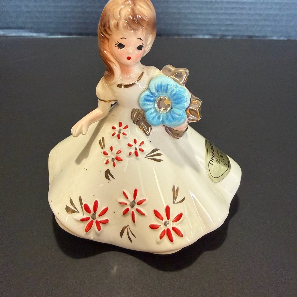 Vintage Ceramic Figurine with Floral Design